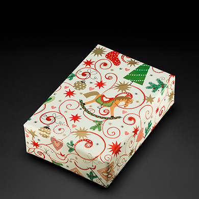 Beispiel eines in dem Geschenkpapier Rapperswil, elfenbein - 49266 verpackten Geschenk